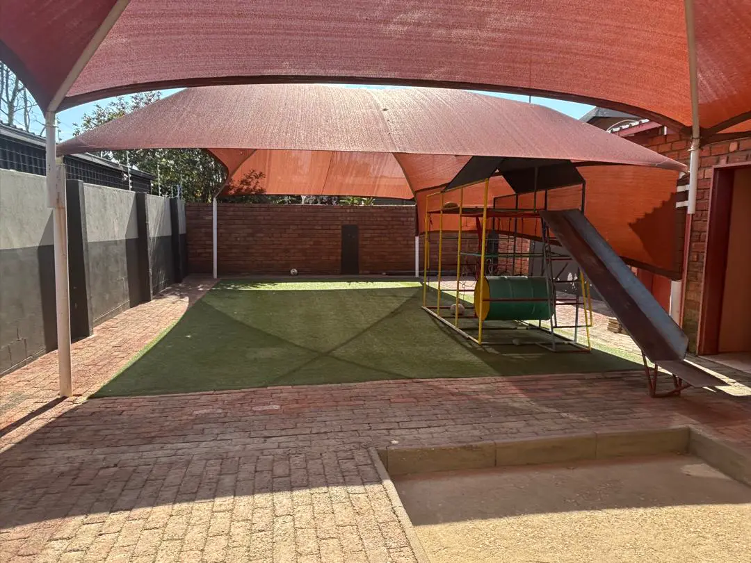 Outside: Shaded back yard