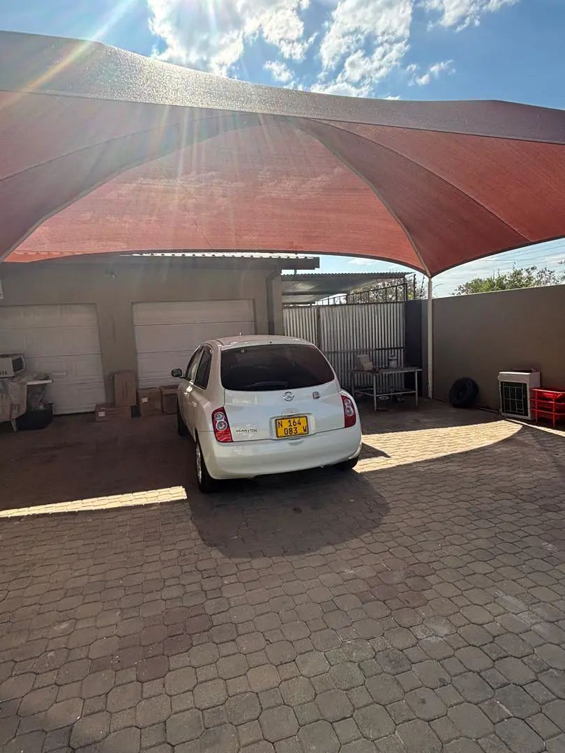 Arrival: Covered parking by the house
